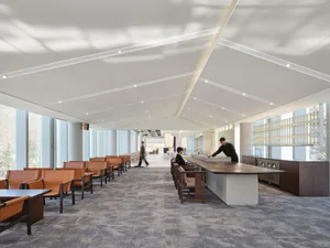 A large event space with rows of chairs, creating a sense of depth and space