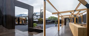 Black building facade with patio and benches, floor plan showing interior rooms and dining table