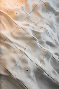 Abstract representation of a building's interior with complex shapes and lines