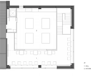 Empty minimalist room with white walls and floors, giving a clean and serene atmosphere