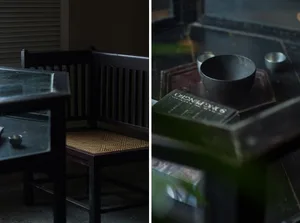 A dark room with a chair in a black and white photo and a chair and a bowl on a table in a colored photo