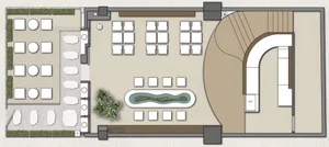 A modern lobby with chairs and a dining table, creating a comfortable and inviting atmosphere
