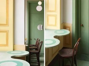 Two dining rooms with round tables and chairs, one with a green color scheme and the other with yellow, set against a backdrop of walls, floors, and furniture