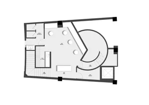 Modern interior space with clean lines, minimalistic elements, and natural light from windows