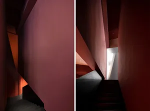 Black and white and red staircase with 14 steps and a window at the bottom right