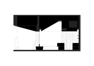 Cozy modern living room with a couch, chair, dining table, and people, dimly lit