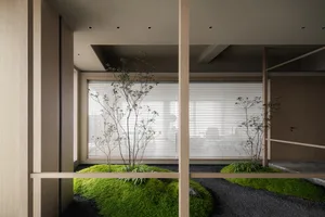 Bright modern living space with wooden elements, sunlight, and potted plants, featuring a comfortable seating area