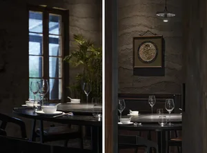 Modern restaurant dining area with tables, chairs, wine glasses, and bowls, creating an inviting atmosphere