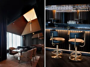 Elegant bar area with comfortable seating, multiple chairs, dining tables, and wine glasses, set in a warm and inviting atmosphere