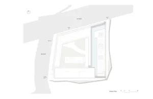 A 2D floor plan of a modern house with labeled rooms, including a living room and kitchen, with chairs and a clock present