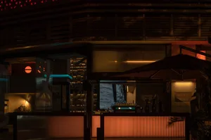 A well-stocked bar with a wooden counter, glassware, and bottles, set in a cozy atmosphere for socializing