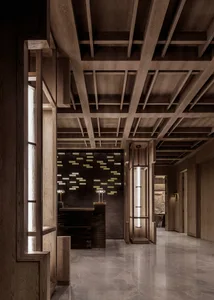 Cozy hallway with a wooden door, window, and furniture, featuring a warm and inviting atmosphere