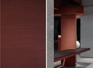 Dining room with a red accent wall, wooden bench, and a dining table, creating a warm and inviting atmosphere