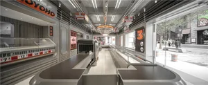 A large open lobby with tables, chairs, and benches, creating a spacious and inviting atmosphere