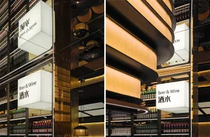 A lively bar with wooden accents, bottles, and chairs, creating a comfortable atmosphere for patrons to enjoy drinks and socialize