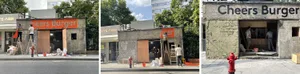 Workers on ladders painting and hammering on a brick building under construction