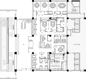 A modern floor plan with multiple chairs and ample natural light