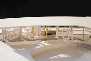 2D floor plan of a modern house with white plastic walls and floors, featuring a living area, dining area, and bedroom