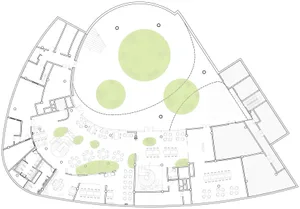 A large open area with multiple chairs scattered throughout, creating a spacious and inviting atmosphere for comfort and functionality