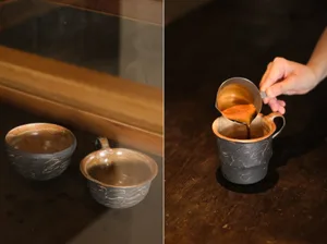 A wooden table with two cups and a coffee pour scene displayed side by side