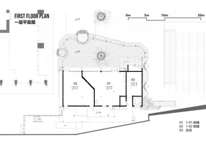 White floor plan of a modern apartment complex with various rooms and linework, labels, and measurements