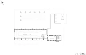 Empty modern lobby with concrete walls, a clean and minimalist appearance, and a calm atmosphere