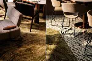 A dining area with chairs and a couch, featuring a comfortable and inviting atmosphere for social gatherings or meals
