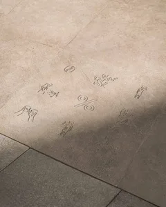 A creative floor plan featuring drawings of people and animals on the ground, with a unique blend of architectural elements and imaginative design
