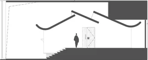 A person stands in front of a doorway looking upwards in a calm and focused residential interior with a staircase in the hallway