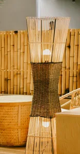 Warm and inviting space with a woven bamboo lamp, natural materials, and a cozy ambiance