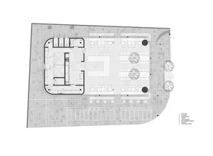 A modern interior space with various seating areas, chairs, and ample room for socializing