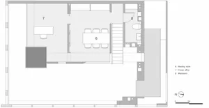 Empty white room with two staircases leading upwards, suggesting multiple levels or floors