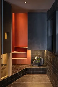Bathroom with a black stone tile floor, modern fixtures, and a clean aesthetic