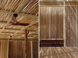 Relaxing outdoor space with wooden beams, bamboo elements, and a traditional bench and ceiling fan