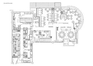 2D floor plan of a modern restaurant with clean lines, minimalistic elements, and various rooms including dining areas and kitchens