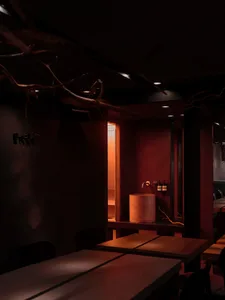 Warm and inviting restaurant with wooden tables and chairs, creating a cozy atmosphere for guests