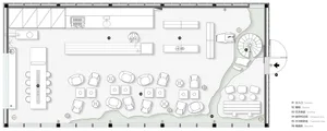 A large room with comfortable seating options, a dining table, and a car, set in a warm and inviting atmosphere
