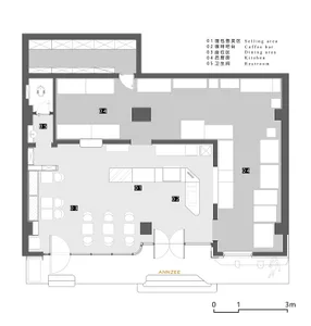 A large, well-lit building with modern architecture, featuring open areas and enclosed rooms, with a focus on clean lines and minimal decoration
