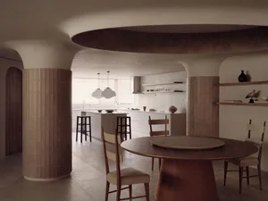 Bright and inviting open kitchen with a dining table, sink, oven, refrigerator, and decorative bottles and bowls