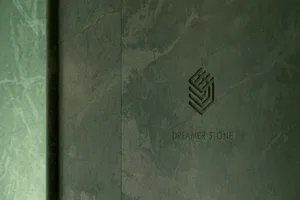 A polished marble wall with a logo or emblem in an upscale, well-maintained setting