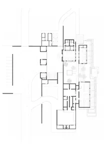 2D floor plan of a modern building with multiple rooms, clean lines, and minimalistic design elements, featuring concrete walls, glass facades, and metal accents