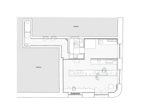 White floor plan drawing on a black background showing a modern house with a living area, kitchen, dining area, and bedroom, featuring furniture placement and dimensions