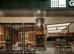 A modern interior design showroom with various pieces of furniture arranged in an inviting and well-organized space