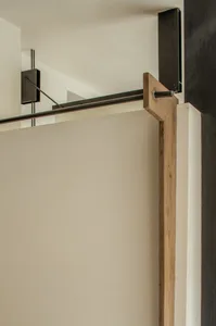 Empty modern room with wooden walls and flooring, creating a clean and minimalist atmosphere