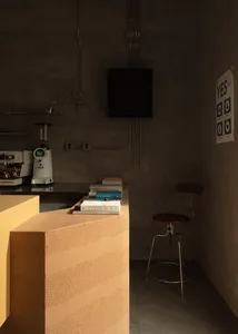 Industrial kitchen with a countertop, chairs, and a dining table, featuring a functional and practical workspace with a focus on efficiency