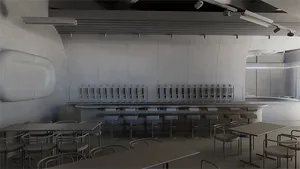 Empty restaurant with a long counter and numerous chairs, clean and well-organized atmosphere