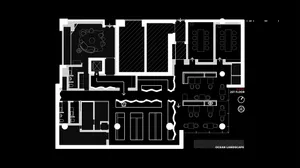Black and white floor plan of a modern office building with multiple rooms and hallways, labeled with kitchen and lounge areas