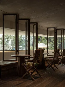 A cozy dining space with a table and three chairs, designed for socializing and enjoying meals together