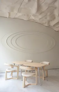 Modern restaurant dining area with wooden tables and chairs, creating a warm and inviting atmosphere