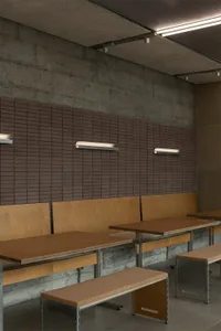 Cozy restaurant interior with wooden tables and benches, creating a warm and inviting atmosphere for guests